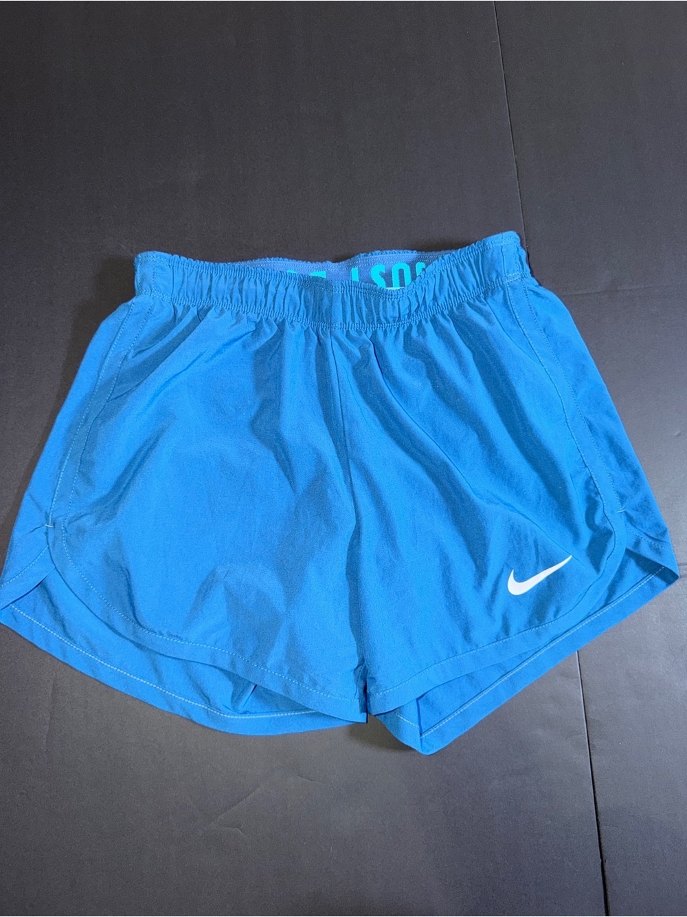 Nike Women's Bright Blue Athletic Running Shorts with White Swoosh